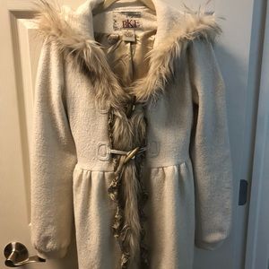 Cream jacket with faux fur and lace trim.